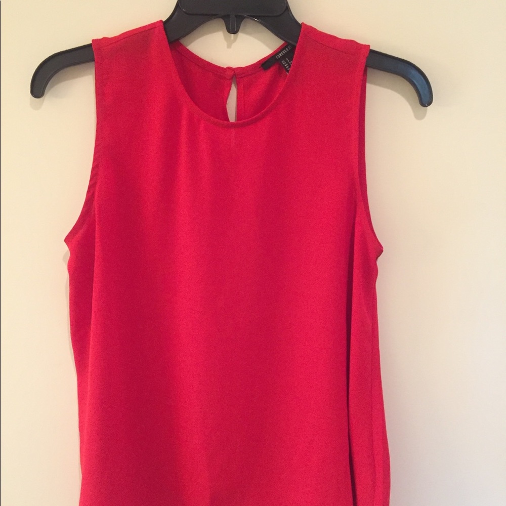 Red formal top, covers shoulder